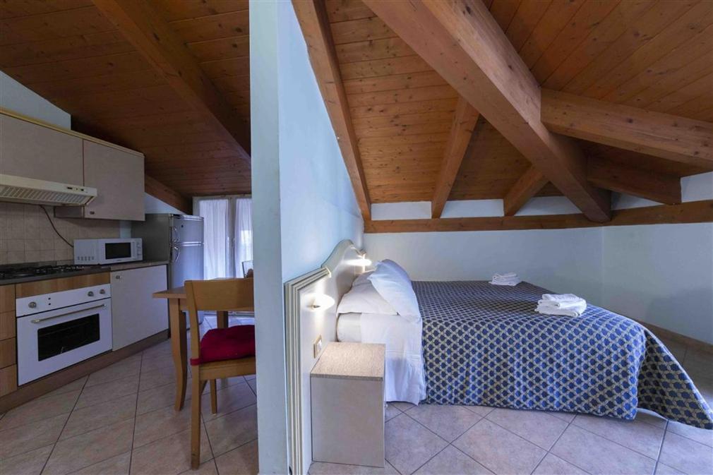 Aparthotel Residenza Melucci Rimini Zimmer foto